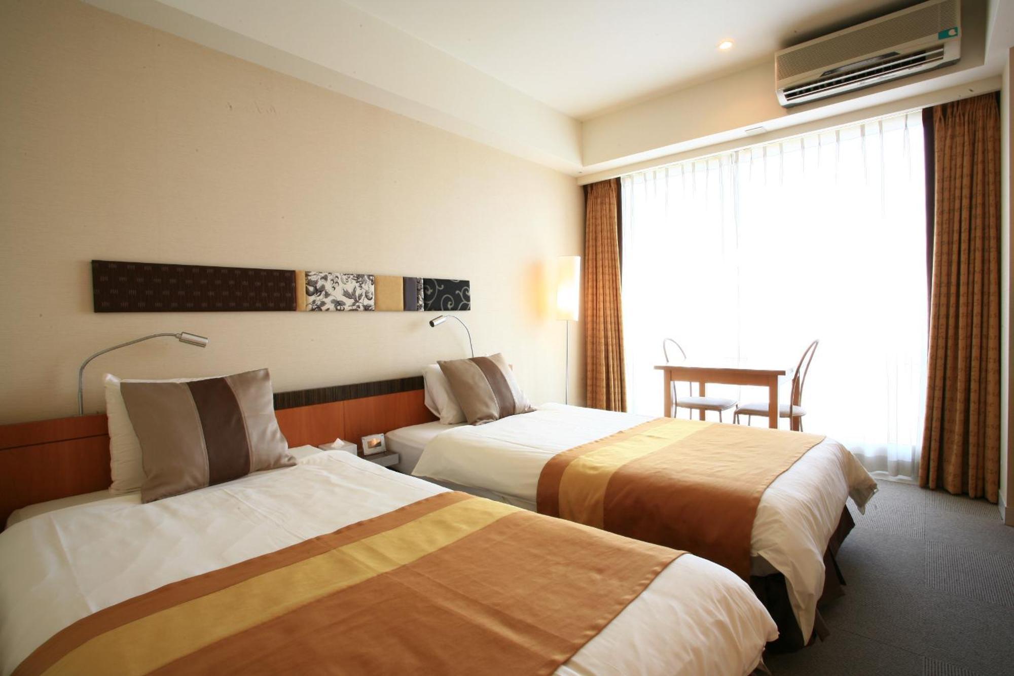 The Beach Tower Okinawa Тятан Экстерьер фото